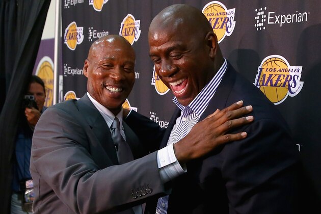 EL SEGUNDO, CA - JULY 29:  Byron Scott (L) and Earvin 'Magic' Johnson share a laugh during a press conference to introduce Byron Scott as the new head coach of the Los Angeles Lakers at Toyota Sports Center on July 29, 2014 in El Segundo, California.  (Photo by Jeff Gross/Getty Images)
