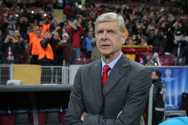 Arsenal's coach Arsene Wenger watches the game during their Champions League Group D soccer match with Galatasaray at the Turk Telekom Arena Stadium in Istanbul, Turkey, Tuesday, Dec. 9, 2014. (AP Photo)