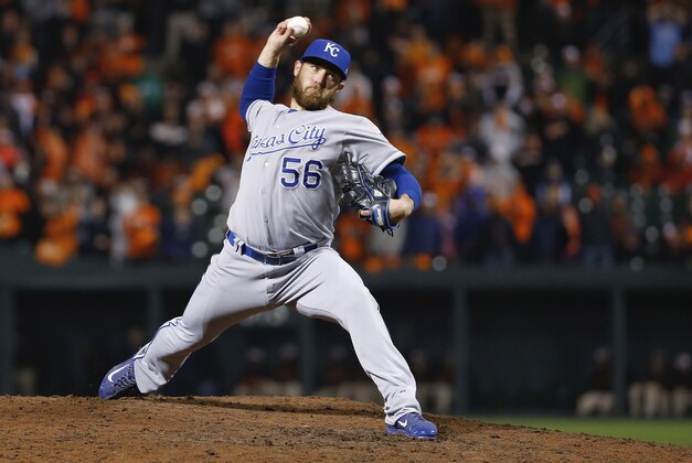 Kansas City Royals relief pitcher Greg Holland (56) throws during the 10th inning of Game 1 of the American League baseball championship series against the Baltimore Orioles Saturday, Oct. 11, 2014, in Baltimore. (AP Photo/Matt Slocum )