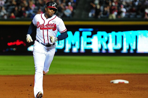 ATLANTA, GA - SEPTEMBER 24: Justin Upton #8 of the Atlanta Braves rounds the bases after hitting a fourth inning two-run home run against the Pittsburgh Pirates at Turner Field on September 24, 2014 in Atlanta, Georgia. (Photo by Scott Cunningham/Getty Images)