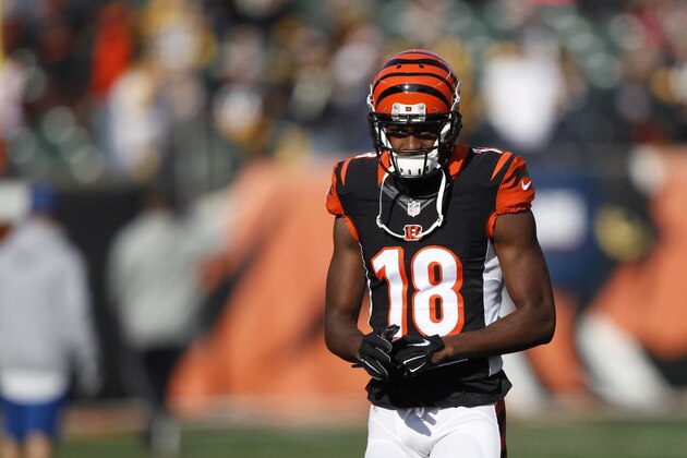 Cincinnati Bengals' A.J. Green (18) warms-up before the start of an NFL football game between the Cincinnati Bengals and the Pittsburgh Steelers Sunday, Dec. 7, 2014 in Cincinnati. (AP Photo/Frank Victores)