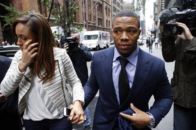 Ray Rice arrives with his wife Janay Palmer for an appeal hearing of his indefinite suspension from the NFL, Wednesday, Nov. 5, 2014, in New York. (AP Photo/Jason DeCrow)
