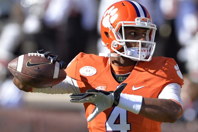 Clemson quarterback Deshaun Watson throws the ball during warm ups before the start of an NCAA college football game against South Carolina, Saturday, Nov. 29, 2014, in Clemson, S.C. (AP Photo/Richard Shiro)