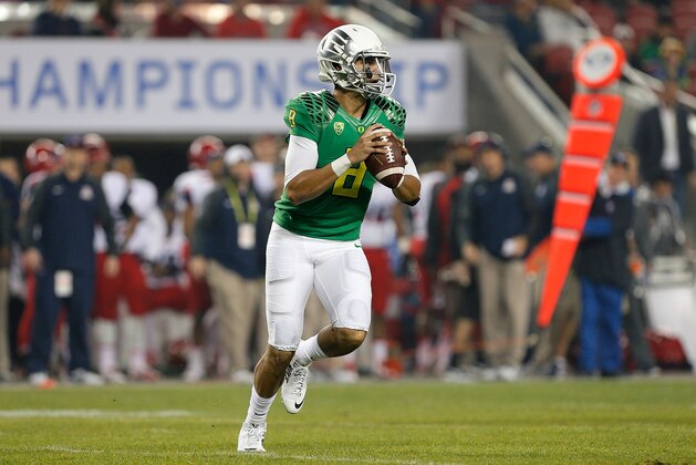 SANTA CLARA, CA - DECEMBER 05: Marcus Mariota #8 of the Oregon Ducks passes early in the first quarter during the PAC-12 Championships at Levi's Stadium against the Arizona Wildcats on December 5, 2014 in Santa Clara, California. (Photo by Brian Bahr/Getty Images)
