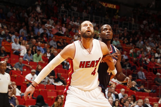 MIAMI, FL - December 3: Josh McRoberts #4 of the Miami Heat looks for the ball against the Atlanta Hawks during the game on December 3, 2014 at American Airlines Arena in Miami, Florida. NOTE TO USER: User expressly acknowledges and agrees that, by downloading and or using this Photograph, user is consenting to the terms and conditions of the Getty Images License Agreement. Mandatory Copyright Notice: Copyright 2014 NBAE (Photo by Isaac Baldizon/NBAE via Getty Images)