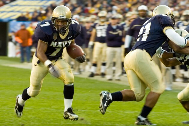 This image provided by the US Navy shows Navy running back Reggie Campbell (7), from Sanford, Fla., sprinting into the end-zone for the Naval Academy's first touchdown of the day, during the 107th playing of the Army vs. Navy football game. Navy won the game 26-14 at Lincoln Financial Field in Philadelphia, Pa., ending the season at 9-3.(AP Photo/ US. Navy Photo - Chad J. McNeeley)