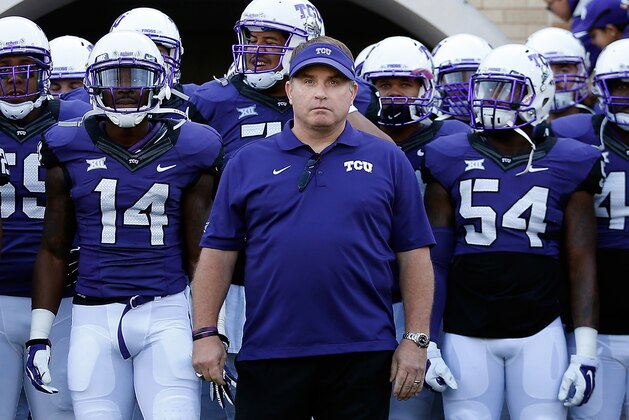 FORT WORTH, TX - DECEMBER 06:  Head coach Gary Patterson of the TCU Horned Frogs leads his team onto the field before the Big 12 college football game against the Iowa State Cyclones at Amon G. Carter Stadium on December 6, 2014 in Fort Worth, Texas. The Horned Frongs defeated the Cyclones 55-3. (Photo by Christian Petersen/Getty Images)