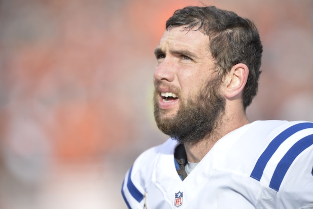 Indianapolis Colts quarterback Andrew Luck stands on the sideline in the second quarter of an NFL football game against the Cleveland Browns Sunday, Dec. 7, 2014, in Cleveland. (AP Photo/David Richard)
