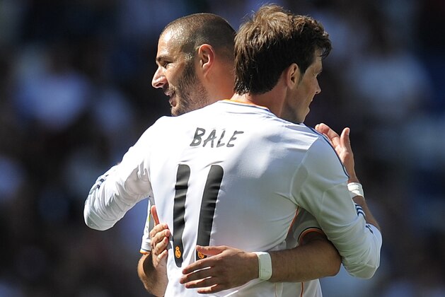 MADRID, SPAIN - MAY 17:  Gareth Bale of Real Madrid CF celebrates with Karim Benzema after scoring Real's opening goal during the La Liga match between Real Madrid CF and RCD Espanyol at Santiago Bernabeu stadium on May 17, 2014 in Madrid, Spain.  (Photo by Denis Doyle/Getty Images)