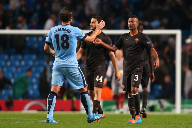 MANCHESTER, ENGLAND - SEPTEMBER 30:  Frank Lampard of Manchester City shakes hands with Ashley Cole of AS Roma at the end of the UEFA Champions League Group E match between Manchester City FC and AS Roma  on September 30, 2014 in Manchester, United Kingdom.  (Photo by Alex Livesey/Getty Images)