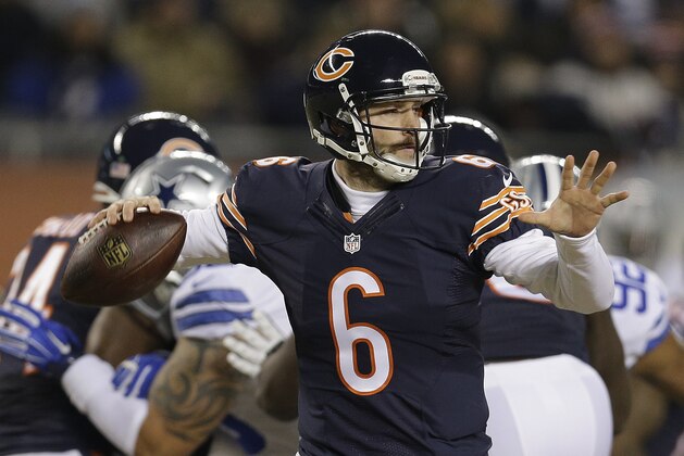 Chicago Bears quarterback Jay Cutler (6) throws a pass during the first half of an NFL football game against the Dallas Cowboys, Thursday, Dec. 4, 2014, in Chicago. (AP Photo/Nam Y. Huh)