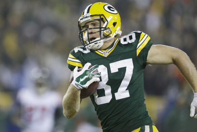 Green Bay Packers' Jordy Nelson catches a 60-yard touchdown pass during the second half of an NFL football game against the Atlanta Falcons Monday, Dec. 8, 2014, in Green Bay, Wis. (AP Photo/Tom Lynn)