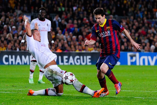 BARCELONA, SPAIN - NOVEMBER 06:  Lionel Messi of FC Barcelona duels for the ball with Philippe Mexes of AC Milan during the UEFA Champions League Group H match Between FC Barcelona and AC Milan at Camp Nou on November 6, 2013 in Barcelona, Spain.  (Photo by David Ramos/Getty Images)