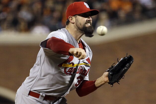 St. Louis Cardinals relief pitcher Pat Neshek throws against the San Francisco Giants during the eighth inning of Game 4 of the National League baseball championship series Wednesday, Oct. 15, 2014, in San Francisco. (AP Photo/Jeff Roberson)
