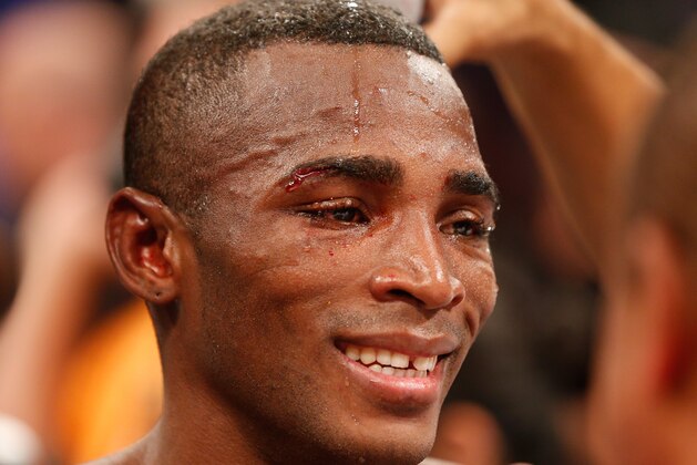 LAS VEGAS, NV - JULY 12:  Erislandy Lara smiles in the ring as he awaits the reading of the judges' score cards after his junior middleweight bout against Canelo Alvarez at the MGM Grand Garden Arena on July 12, 2014 in Las Vegas, Nevada.  Alvarez defeated Lara by split decision. (Photo by Josh Hedges/Getty Images)
