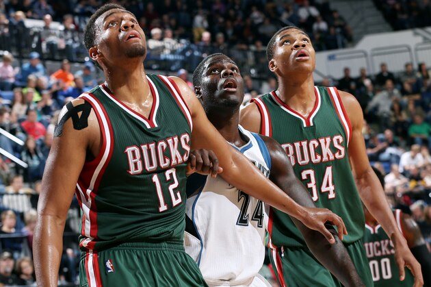 MINNEAPOLIS, MN - OCTOBER 17: Jabari Parker #12 and Giannis Antetokounmpo #34 of the Milwaukee Bucks battle for position against Anthony Bennett #24 of the Minnesota Timberwolves on October 17, 2014 at U.S. Cellular Center in Cedar Rapids, Iowa. NOTE TO USER: User expressly acknowledges and agrees that, by downloading and or using this Photograph, user is consenting to the terms and conditions of the Getty Images License Agreement. Mandatory Copyright Notice: Copyright 2014 NBAE (Photo by David Sherman/NBAE via Getty Images)