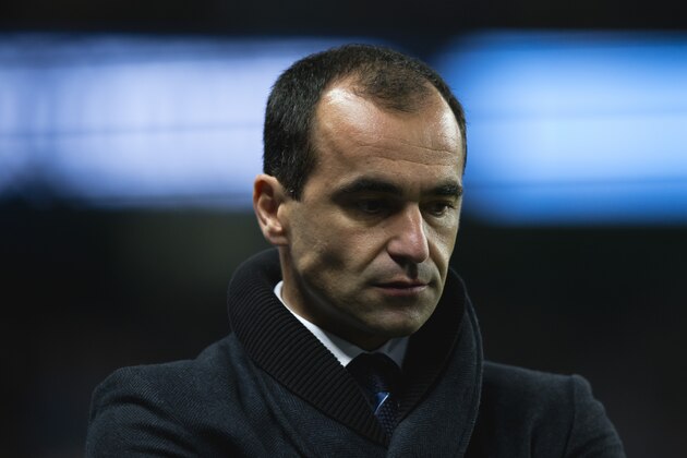 Everton's manager Roberto Martinez takes to the touchline before his team's English Premier League soccer match against Manchester City at the Etihad Stadium, Manchester, England, Saturday Dec. 6, 2014. (AP Photo/Jon Super)