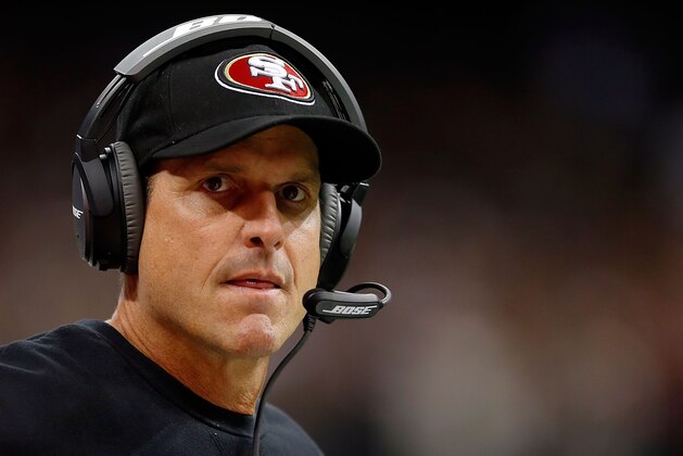 NEW ORLEANS, LA - NOVEMBER 09:  Head coach Jim Harbaugh of the San Francisco 49ers watches action during the fourth quarter of a game against the New Orleans Saints at the Mercedes-Benz Superdome on November 9, 2014 in New Orleans, Louisiana.  (Photo by Wesley Hitt/Getty Images)