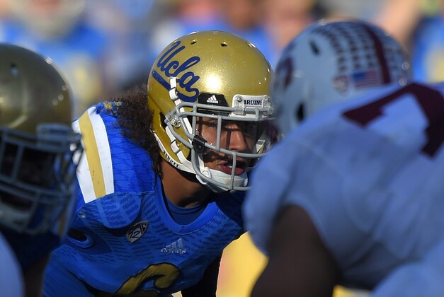 UCLA linebacker Eric Kendricks gets read to run a play during the second half of an NCAA college football game against Stanford, Friday, Nov. 28, 2014, in Pasadena, Calif. Stanford won 31-10. (AP Photo/Mark J. Terrill)