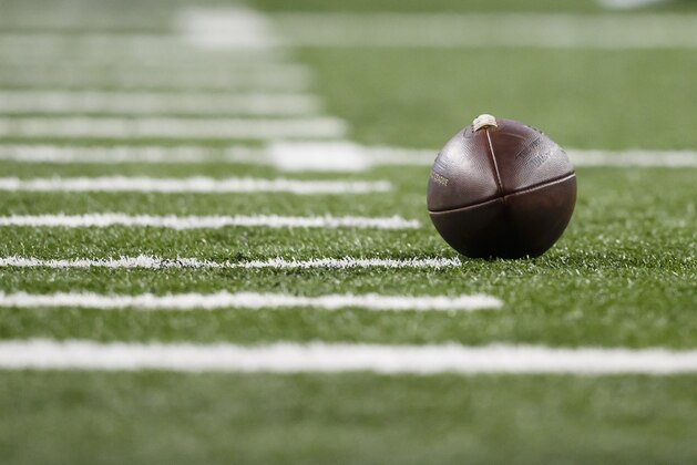 Football on the field during an NFL football game between the Detroit Lions and the Tampa Bay Buccaneers at Ford Field in Detroit, Sunday, Dec. 7, 2014. (AP Photo/Rick Osentoski)