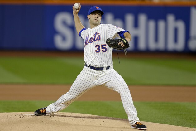 New York Mets' Dillon Gee (35) delivers a pitch during the first inning of a baseball game against the Miami Marlins Wednesday, Sept. 17, 2014, in New York. (AP Photo/Frank Franklin II)