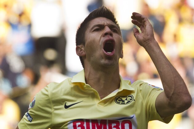America's Oribe Peralta reacts after a referee disallows his goal against Tijuana during a Mexican soccer league match in Mexico City, Saturday, July 26, 2014. (AP Photo/Christian Palma)