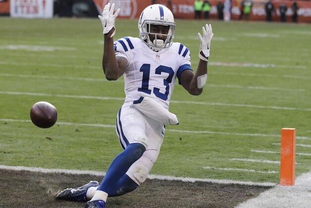 Indianapolis Colts wide receiver T.Y. Hilton can't hang on to a pass in the end zone in the third quarter of an NFL football game against the Cleveland Browns Sunday, Dec. 7, 2014, in Cleveland. (AP Photo/Tony Dejak)
