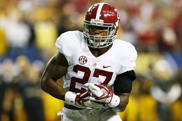 ATLANTA, GA - DECEMBER 06:  Derrick Henry #27 of the Alabama Crimson Tide runs the ball against the Missouri Tigers in the first quarter of the SEC Championship game at the Georgia Dome on December 6, 2014 in Atlanta, Georgia.  (Photo by Kevin C. Cox/Getty Images)