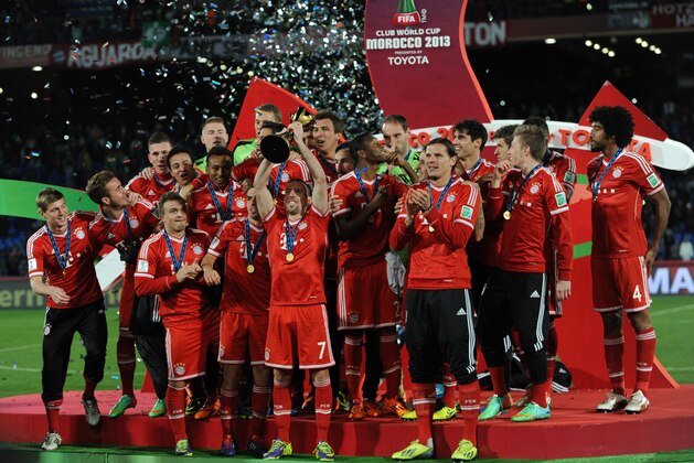 MARRAKECH, MOROCCO - DECEMBER 21:  The FC Bayern Munchen players celebrate after winning the FIFA Club World Cup after the FIFA Club World Cup Final match between FC Bayern Munchen v Raja Casablanca at Marrakech Stadium on December 21, 2013 in Marrakech, Morocco.  (Photo by Steve Bardens/Getty Images for Toyota)