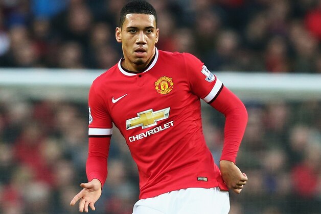 MANCHESTER, ENGLAND - NOVEMBER 29:  Chris Smalling of Manchester United in action during the Barclays Premier League match between Manchester United and Hull City at Old Trafford on November 29, 2014 in Manchester, England.  (Photo by Matthew Lewis/Getty Images)