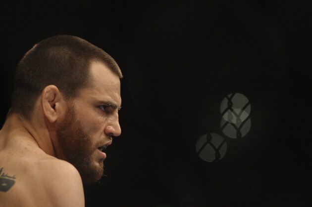 SYDNEY, AUSTRALIA - FEBRUARY 27:  Jon Fitch of the USA looks across the octagon at BJ Penn of the USA before the start of their welterweight bout part of UFC 127 at Acer Arena on February 27, 2011 in Sydney, Australia.  (Photo by Mark Kolbe/Getty Images)