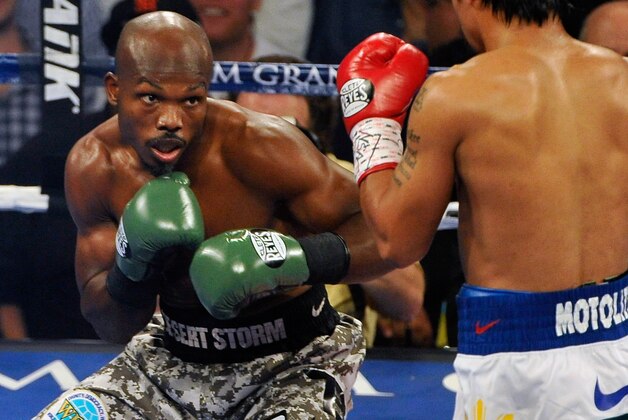 LAS VEGAS, NV - APRIL 12:  Timothy Bradley (L) and Manny Pacquiao battle it out during their WBO world welterweight championship boxing match at the MGM Grand Garden Arena on April 12, 2014 in Las Vegas, Nevada. Pacquiao won by unanimous decision.  (Photo by David Becker/Getty Images)