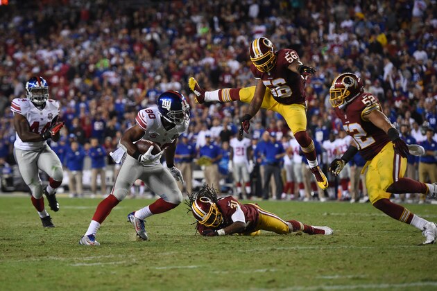 LANDOVER, MD - SEPTEMBER 25: Wide receiver Victor Cruz #80 of the New York Giants runs past inside linebacker Perry Riley #56 of the Washington Redskins during the 3rd quarter of their game at FedExField on September 25, 2014 in Landover, Maryland. (Photo by Patrick Smith/Getty Images)