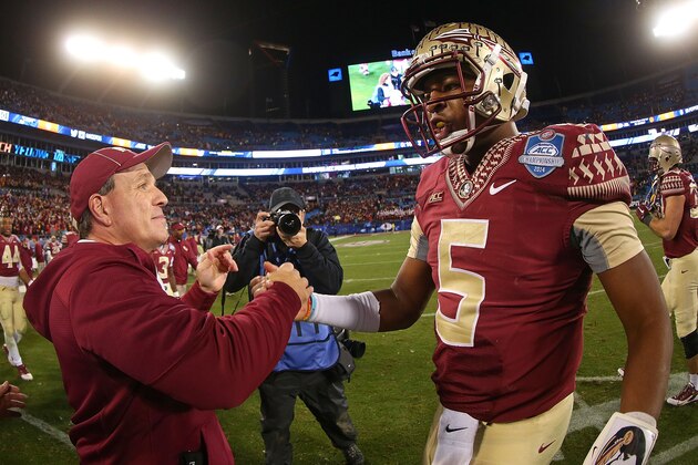 CHARLOTTE, NC - DECEMBER 06:  Head coach Jimbo Fisher and Jameis Winston #5 of the Florida State Seminoles congratulate each other after their 37-35 victory over the Georgia Tech Yellow Jackets at the ACC Championship game on December 6, 2014 in Charlotte, North Carolina.  (Photo by Mike Ehrmann/Getty Images)