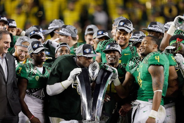 SANTA CLARA, CA - DECEMBER 05:  The Oregon Ducks celebrate their PAC-12 victory against the Arizona Wildcats at Levi's Stadium on December 5, 2014 in Santa Clara, California.  (Photo by Brian Bahr/Getty Images)