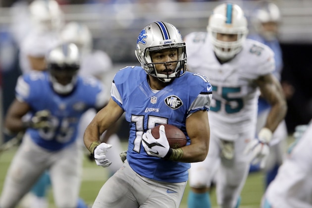 Detroit Lions wide receiver Golden Tate (15) runs during the second half of an NFL football game against the Miami Dolphins in Detroit, Sunday, Nov. 9, 2014. (AP Photo/Duane Burleson)
