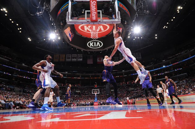 LOS ANGELES, CA - DECEMBER 8: Blake Griffin #32 of the Los Angeles Clippers dunks against the Phoenix Suns on December 8, 2014 at STAPLES Center in Los Angeles, California. NOTE TO USER: User expressly acknowledges and agrees that, by downloading and/or using this Photograph, user is consenting to the terms and conditions of the Getty Images License Agreement. Mandatory Copyright Notice: Copyright 2014 NBAE (Photo by Andrew D. Bernstein/NBAE via Getty Images)