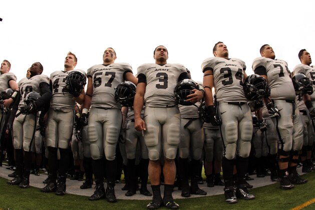Nov 22, 2014; West Point, NY, USA;  Army Black Knights quarterback Angel Santiago (3) stands with teammates after leading West Point past Fordham 42-30 on senior day against the Fordham Rams at Michie Stadium. Mandatory Credit: Danny Wild-USA TODAY Sports