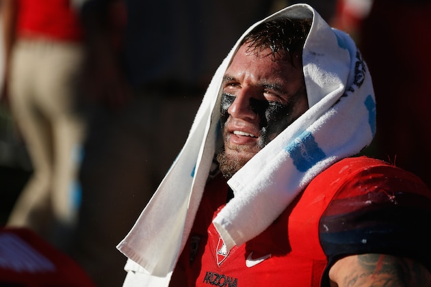TUCSON, AZ - NOVEMBER 28:  Linebacker Scooby Wright III #33 of the Arizona Wildcats watches the Territorial Cup college football game against the Arizona State Sun Devils in the third quarter at Arizona Stadium on November 28, 2014 in Tucson, Arizona.  (Photo by Christian Petersen/Getty Images)