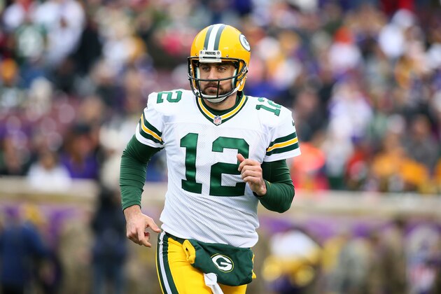 MINNEAPOLIS, MN - NOVEMBER 23: Aaron Rodgers #12 of the Green Bay Packers runs off the field at the end of the first half against the Minnesota Vikings on November 23, 2014 at TCF Bank Stadium in Minneapolis, Minnesota. (Photo by Adam Bettcher/Getty Images)