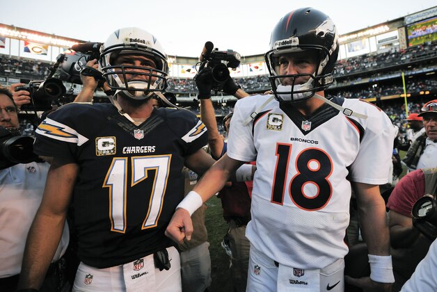 Denver Broncos quarterback Peyton Manning (18) talks with San Diego Chargers quarterback Philip Rivers (17) after an NFL football game on Sunday, Nov. 10, 2013, in San Diego. The Broncos won 28-20. (AP Photo/Denis Poroy) Denver Broncos quarterback Peyton Manning (18) talks with San Diego Chargers quarterback Philip Rivers (17) after an NFL football game on Sunday, Nov. 10, 2013, in San Diego. The Broncos won 28-20. (AP Photo/Denis Poroy)