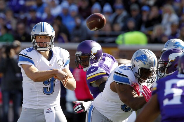 Detroit Lions quarterback Matthew Stafford (9) passes during the first half of an NFL football game against the Minnesota Vikings, Sunday, Oct. 12, 2014, in Minneapolis. (AP Photo/Ann Heisenfelt)