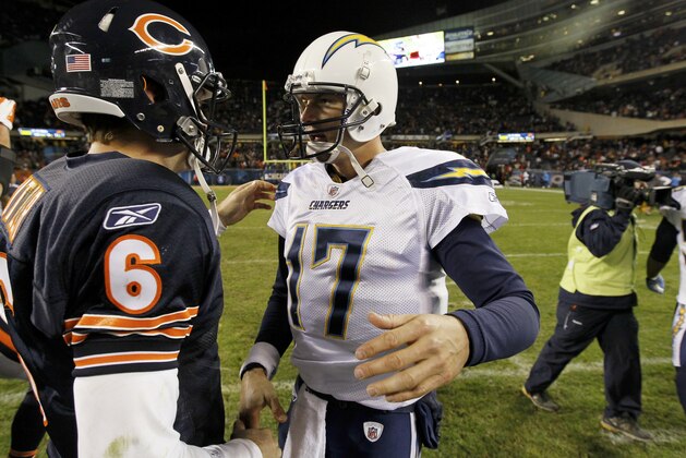 Chicago Bears quarterback Jay Cutler (6) and San Diego Chargers quarterback Philip Rivers (17) greet each other after their NFL football game in Chicago, Sunday, Nov. 20, 2011. The Bears won 31-20. (AP Photo/Charles Rex Arbogast)