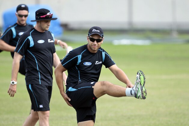 New Zealand’s Ross Taylor, center, stretches during a practice session on the eve of their first one-day international (ODI) cricket match against Bangladesh in Dhaka, Bangladesh, Monday, Oct. 28, 2013. (AP Photo/A.M. Ahad)