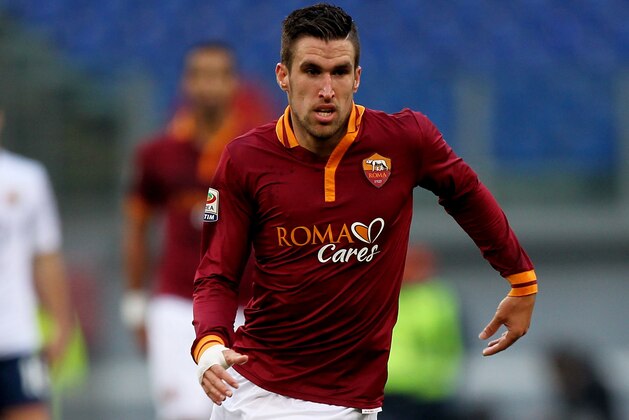 ROME, ITALY - JANUARY 12:  Kevin Strootman of AS Roma in action during the Serie A match between AS Roma and Genoa CFC at Stadio Olimpico on January 12, 2014 in Rome, Italy.  (Photo by Paolo Bruno/Getty Images)