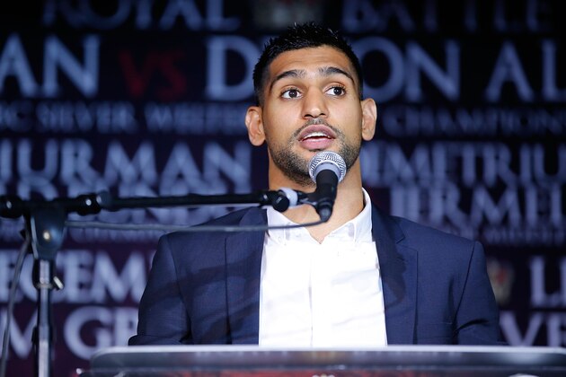 LOS ANGELES, CA - NOVEMBER 04:  Amir Khan speaks onstage during the Amir Khan & Devon Alexander Fight Announcement at The Conga Room on November 4, 2014 in Los Angeles, California.  (Photo by Joe Scarnici/Getty Images)