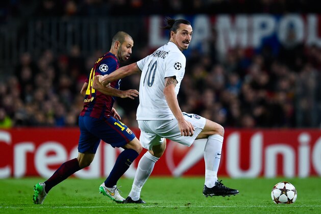 BARCELONA, SPAIN - DECEMBER 10:  Zlatan Ibraimovic of Paris Saint-Germain FC competes for the ball with Javier Mascherano of FC Barcelona during prior to the UEFA Champions League group F match between FC Barcelona and Paris Saint-Germanin FC at Camp Nou Stadium on December 10, 2014 in Barcelona, Spain.  (Photo by David Ramos/Getty Images)
