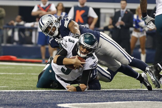 Nov 27, 2014; Arlington, TX, USA; Philadelphia Eagles quarterback Mark Sanchez (3) scores a touchdown in the first quarter against the Dallas Cowboys at AT&T Stadium. Mandatory Credit: Matthew Emmons-USA TODAY Sports