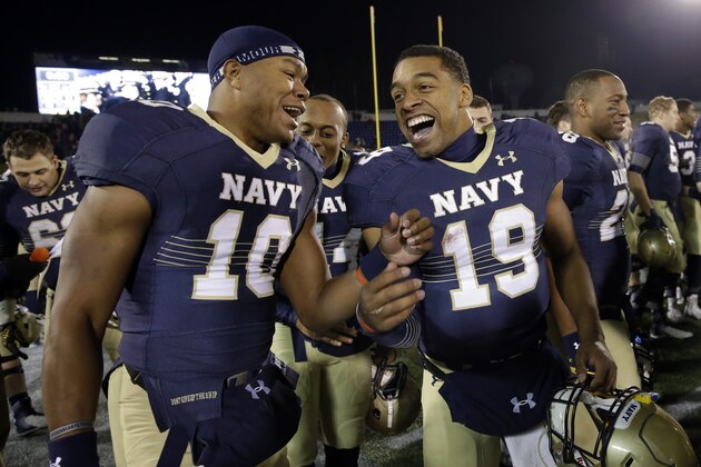 Navy quarterback Keenan Reynolds, right, celebrates with teammate John Hendrick after an NCAA college football game against Georgia Southern, Saturday, Nov. 15, 2014, in Annapolis, Md. Reynolds ran for six touchdowns to lead Navy over Georgia Southern 52-19. (AP Photo/Patrick Semansky) Navy quarterback Keenan Reynolds, right, celebrates with teammate John Hendrick after an NCAA college football game against Georgia Southern, Saturday, Nov. 15, 2014, in Annapolis, Md. Reynolds ran for six touchdowns to lead Navy over Georgia Southern 52-19. (AP Photo/Patrick Semansky)