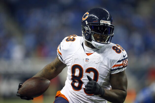 Chicago Bears tight end Martellus Bennett (83) runs with the ball after making a catch against the Detroit Lions during an NFL football game on Thursday, Nov. 27, 2014 in Detroit. The Lions won the game 34-17. (Jeff Haynes/AP Images for Panini)